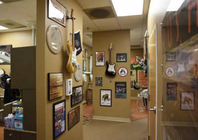 a photo of doctor halls office full of rock and roll memorailia